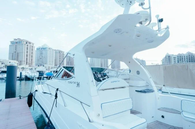 Spacious interior seating area of a private yacht in Qatar
