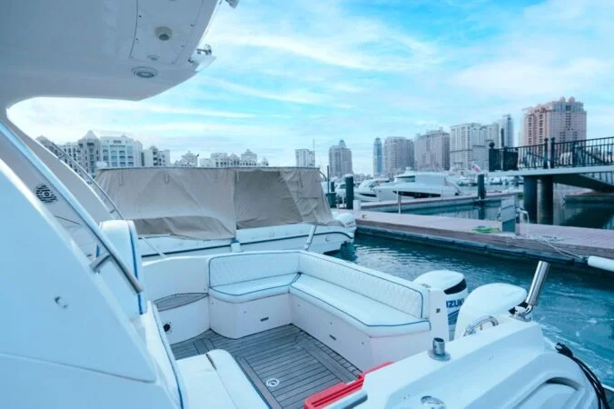 Relaxing outdoor deck seating on a luxury yacht in Qatar