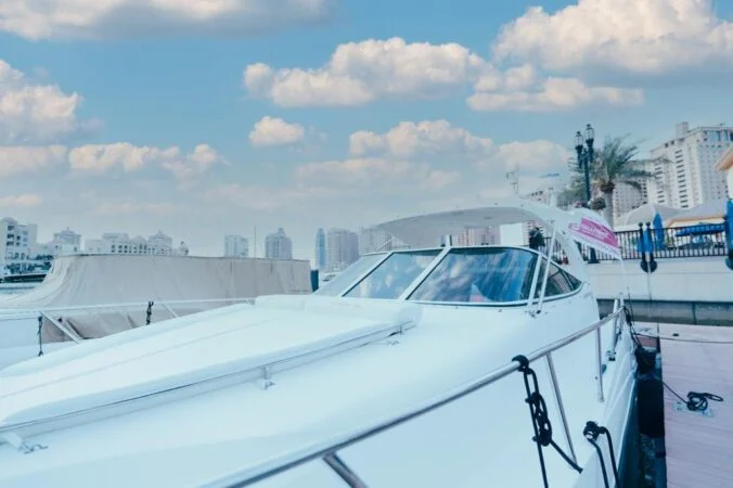 Private yacht cruise with Doha skyline in the background