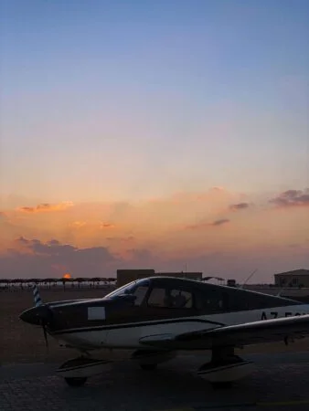 Piper Archer 3-seater plane on runway in Qatar
