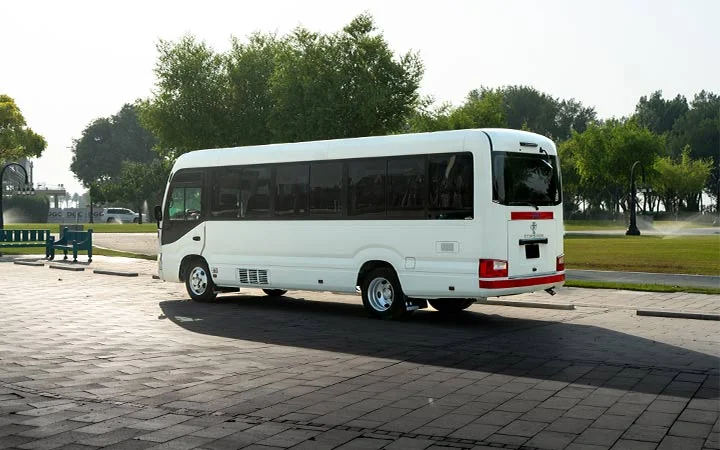 Rear exterior of Coaster bus for group transport in Doha Qatar