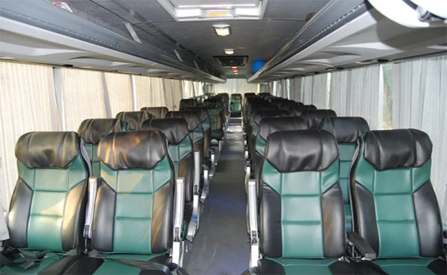 Comfortable economy coach seating for group trips in Doha