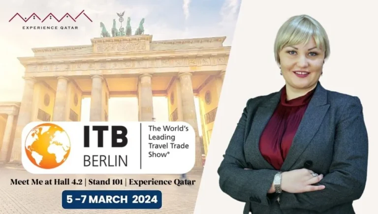 A woman in a grey suit stands confidently with arms crossed beside an ITB Berlin 2024 expo banner, featuring the Brandenburg Gate and event details for 5-7 March, promoting Experience Qatar with Qatar DMC.