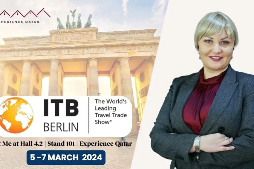 A woman in a grey suit stands confidently with arms crossed beside an ITB Berlin 2024 expo banner, featuring the Brandenburg Gate and event details for 5-7 March, promoting Experience Qatar with Qatar DMC.