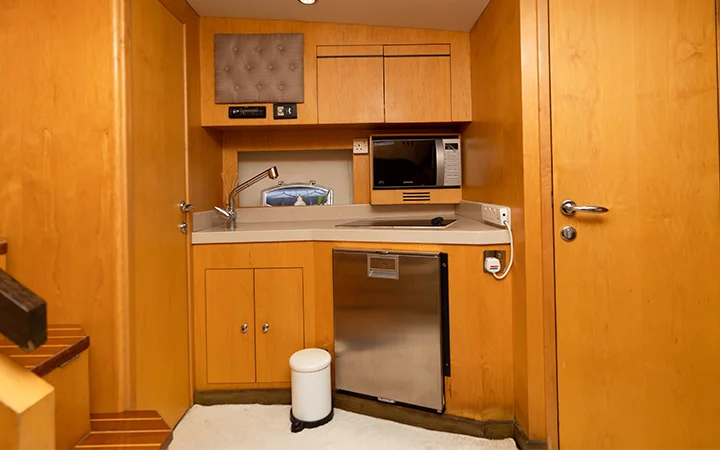 Kitchen and modern facilities onboard luxury yacht rental in Qatar