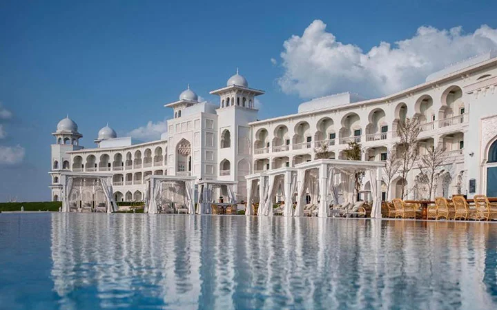 Elegant beachfront pool at Chedi Katara Hotel in Doha Qatar