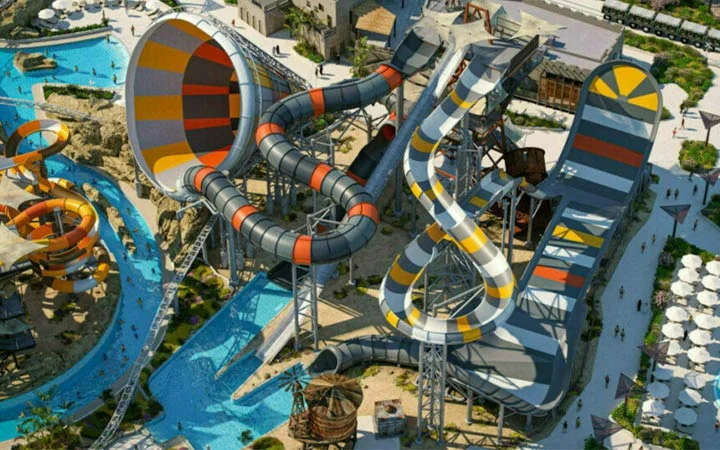 Aerial view of Meryal Waterpark in Qatar with colorful slides and pools