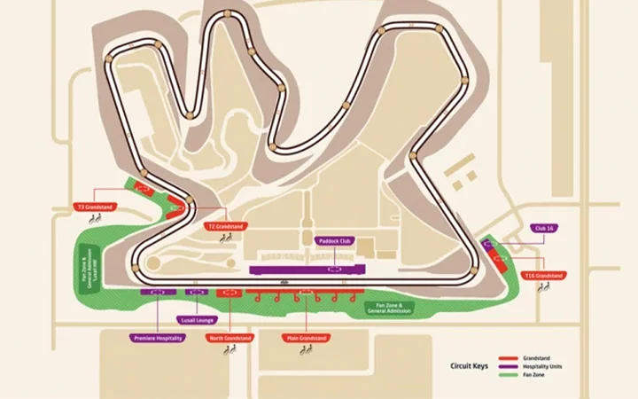 A map of a racetrack with a winding circuit, marked grandstands, Lusail Hill Lounge, hospitality units, club, and fan zones labeled in green, red, and purple. The layout features corners, straights, and designated spectator areas.